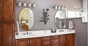 2 sinks with wooden drawers. 