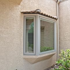 Window with frame and blinds.